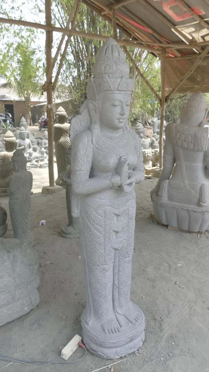  Product image 2 of the product “Standing Sri Dewi. Made from riverstone. Height 180cm ”